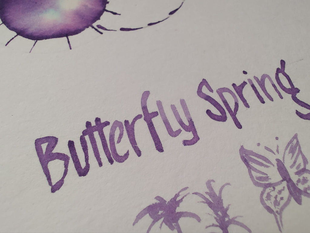 Butterfly Spring bottled fountain pen ink by Shanghai Stationary, violet coloured ink, ink swatching, glass ink bottle