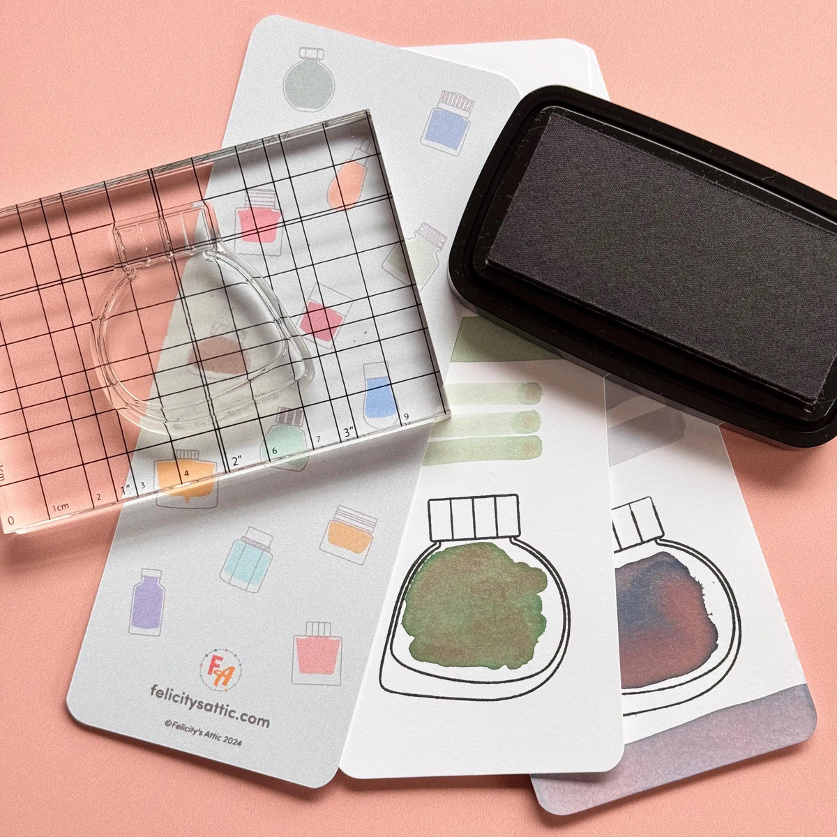 Clear ink stamp set W features 4 ink bottle shaped stamps based on the fountain pen ink brand Kitty Ink Pot. Clear Ink Bottle Shaped Stamps for fountain pen ink swatching & creative journaling.